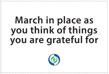 The image is a white card with the text "March in place as you think of things you are grateful for" written on it.