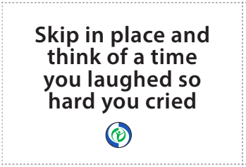 The image is a white card with the text "Skip in place and think of a time you laughed so hard you cried" written on it.